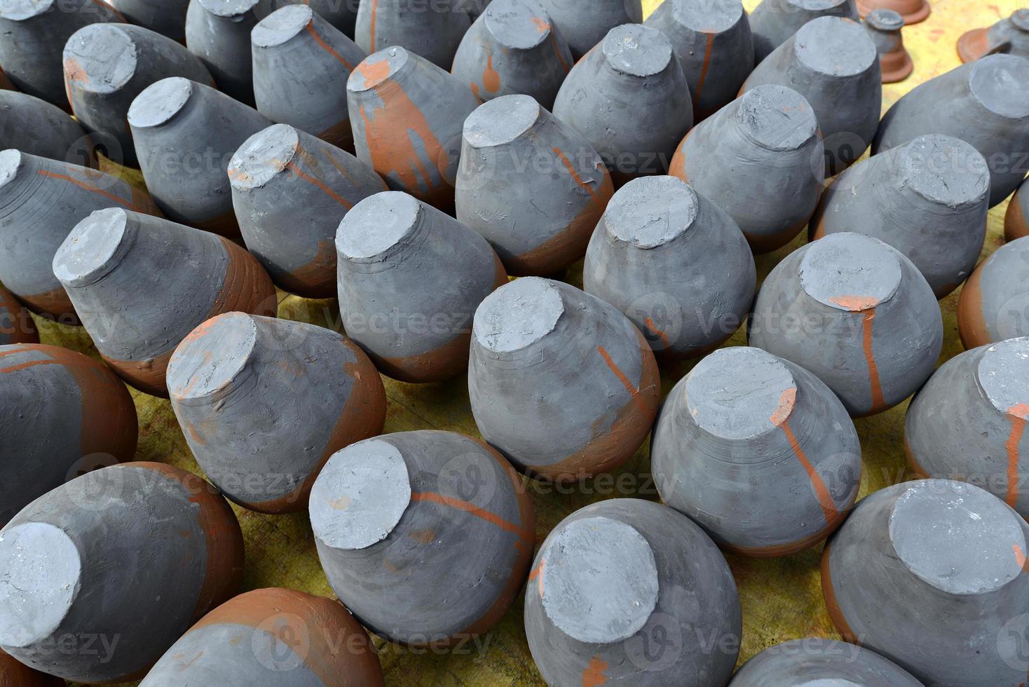 Rows of handmade traditional potteries in Bhaktapur, Nepal photo
