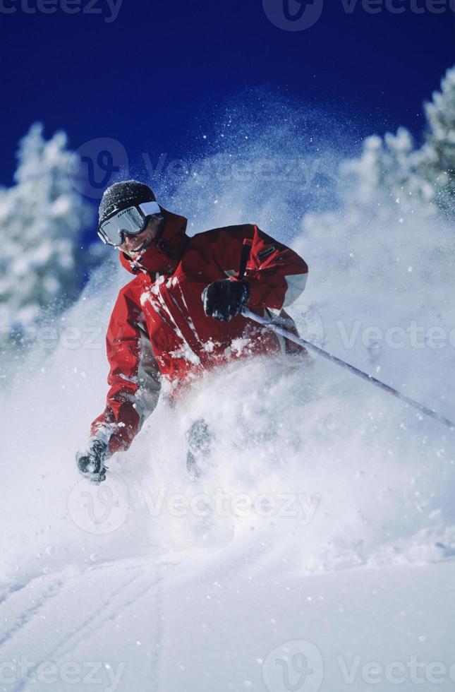 Skier Skiing In Powder Snow Stock Photo At Vecteezy