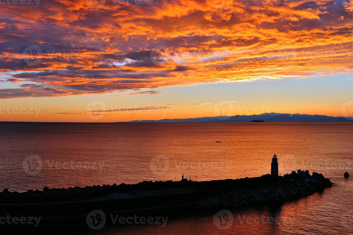 Sunset  lighthouse photo