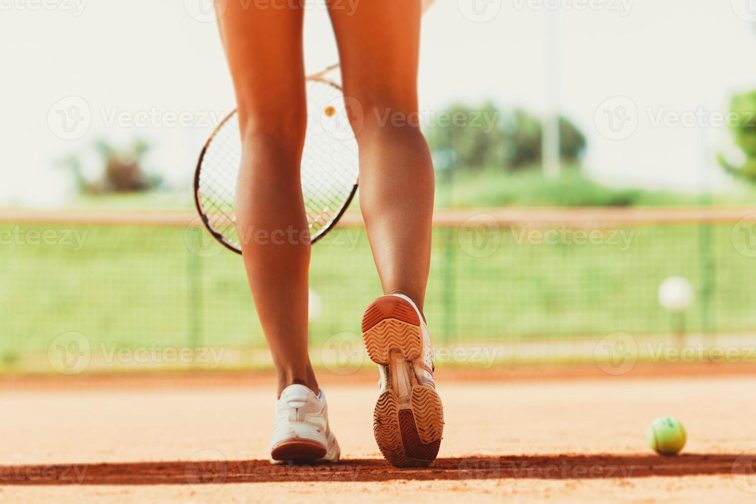 Female tennis player legs photo