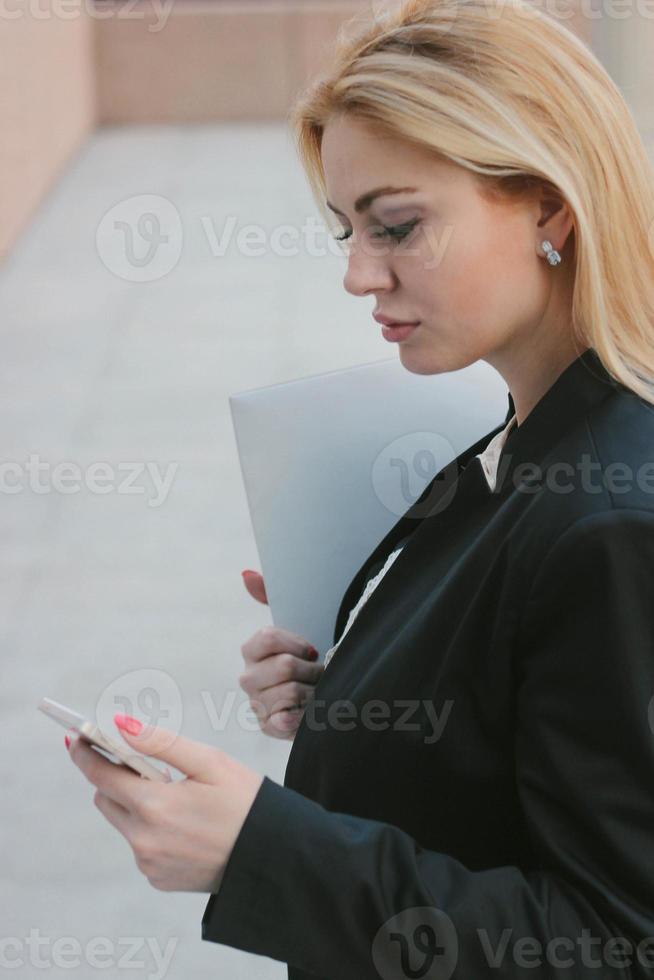 Female model with mobile overside photo