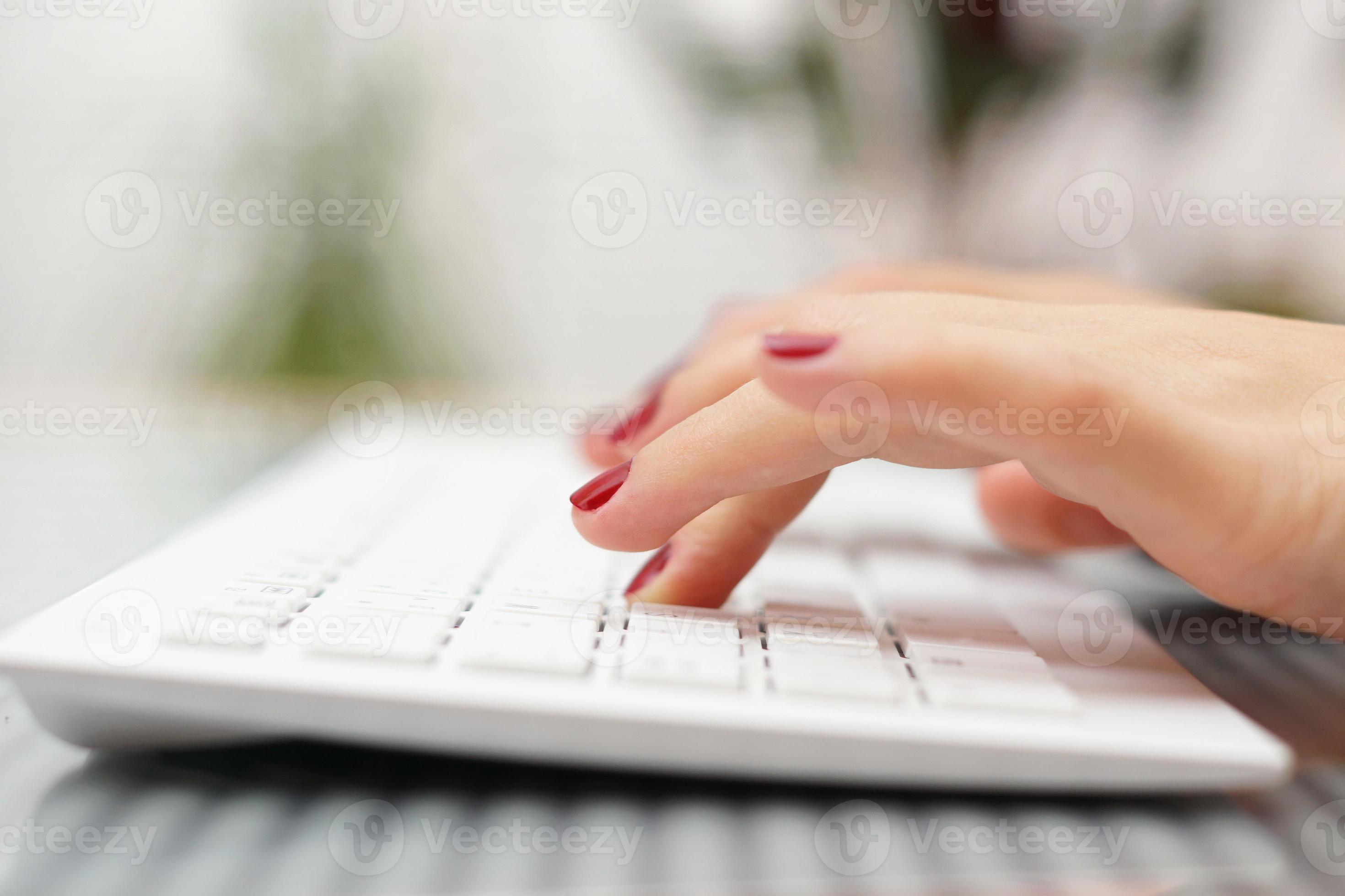 female fingers typing on white keyboard 754261 Stock Photo at Vecteezy