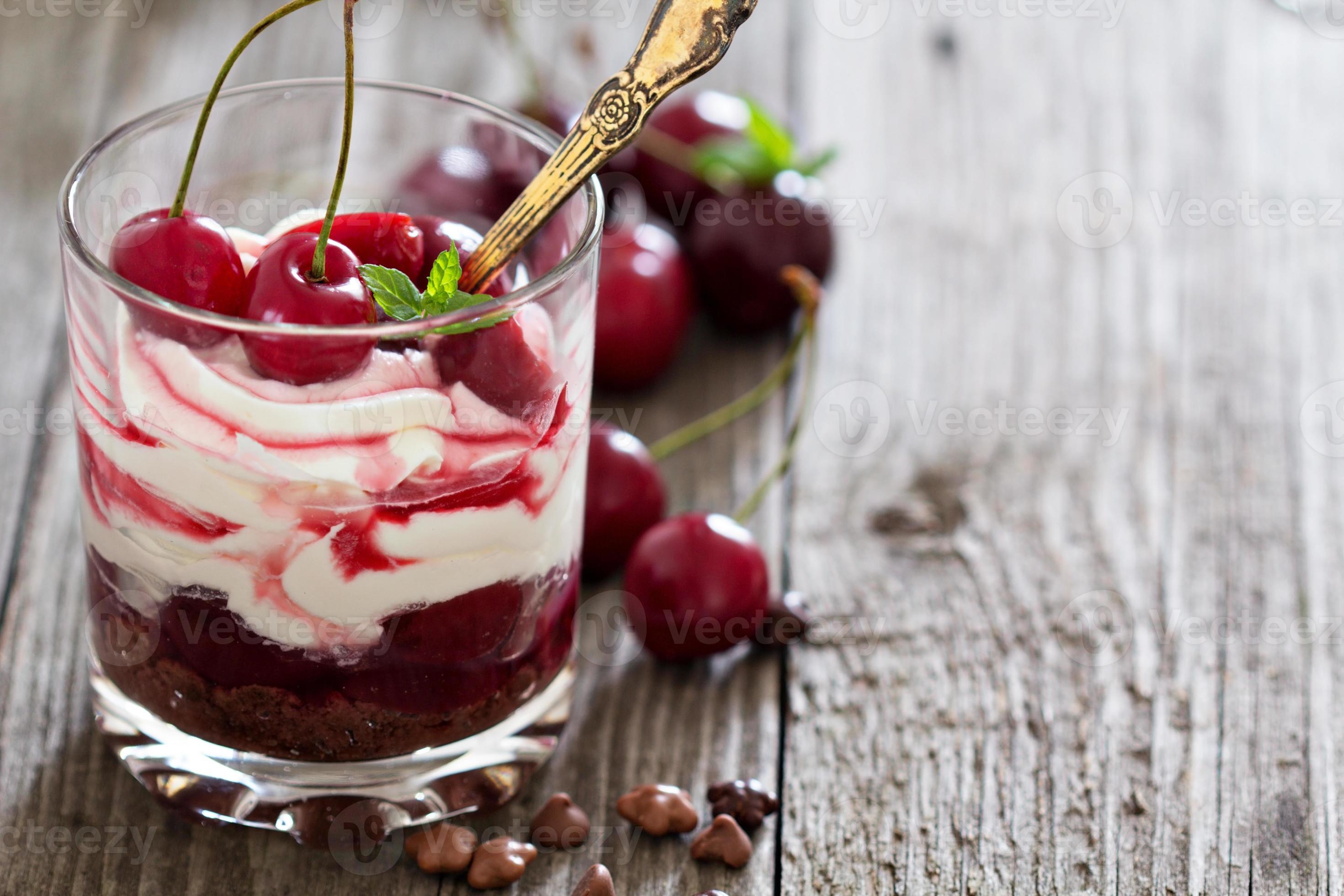 Sweet cherry cheesecake in a glass photo