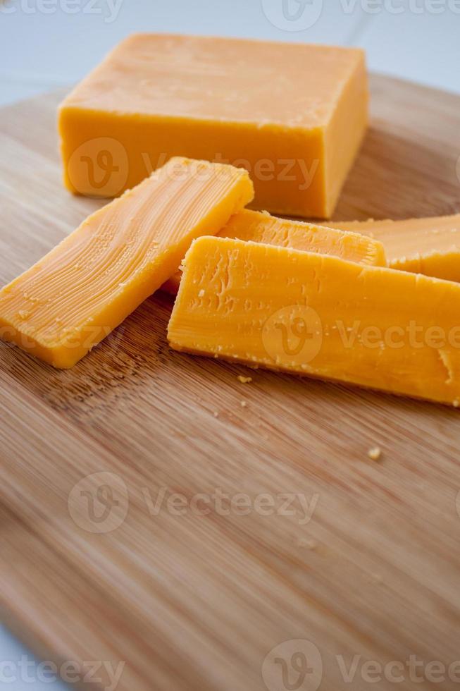 Cheddar Cheese Block and Slices 761092 Stock Photo at Vecteezy