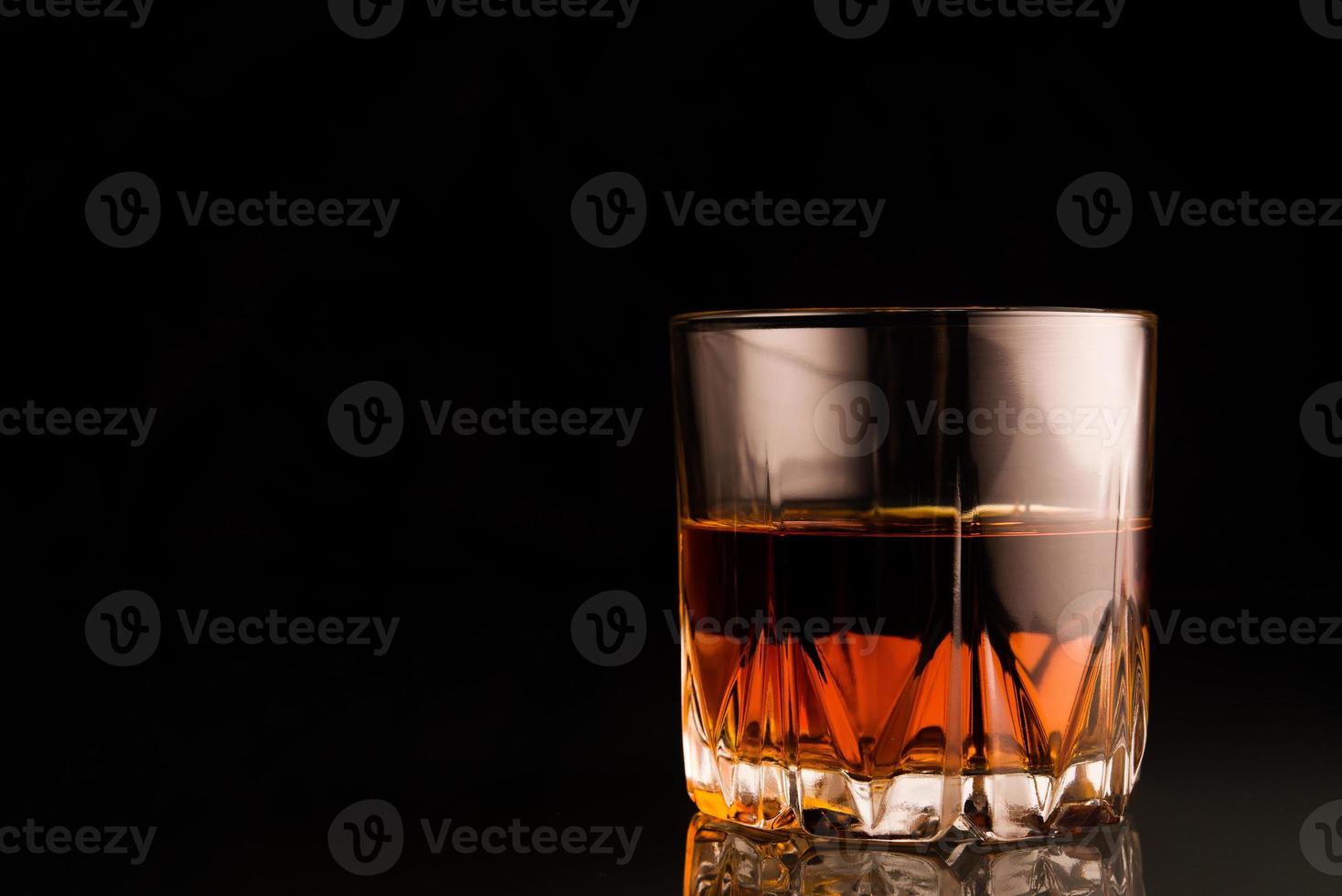 Glass of scotch whiskey photo