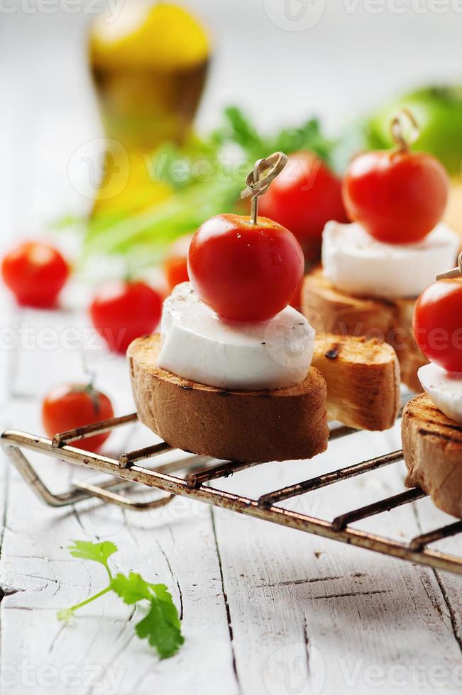 Italian crostini with mozzarella and tomato 762573 Stock Photo at Vecteezy