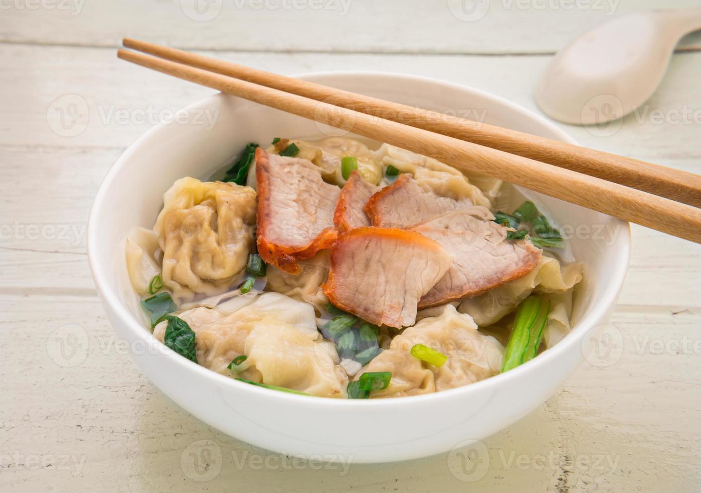 Wonton soup with roasted red pork, Chinese food photo
