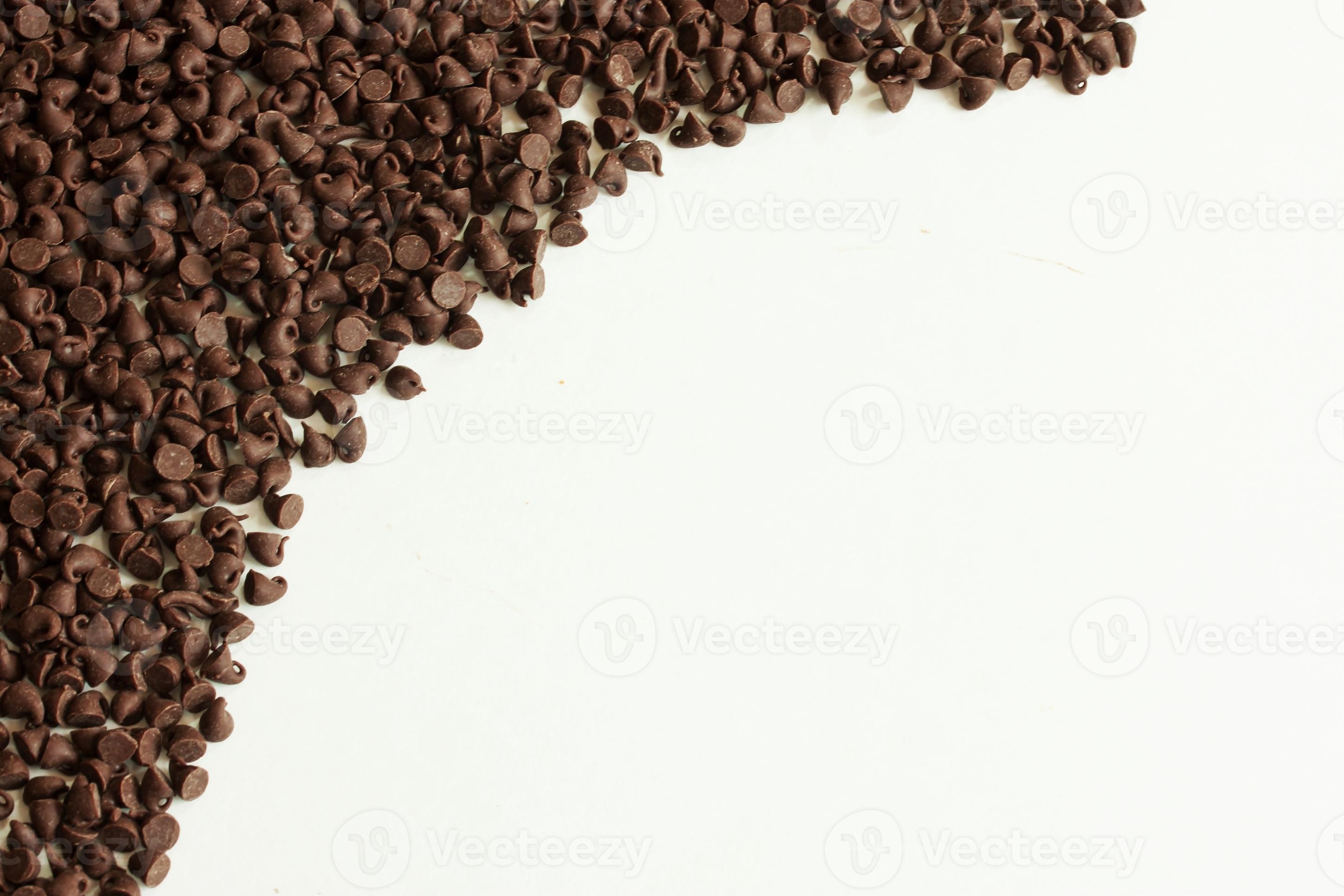 Chocolate chips background 763475 Stock Photo at Vecteezy