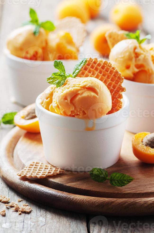 Apricot ice-cream with mint photo
