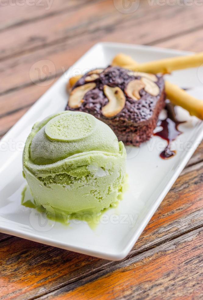 Brownie cake and green tea ice cream photo