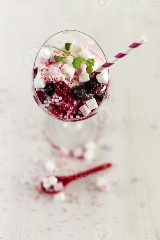 an pink suqar berry fruit and strawberry vanilla icecream photo