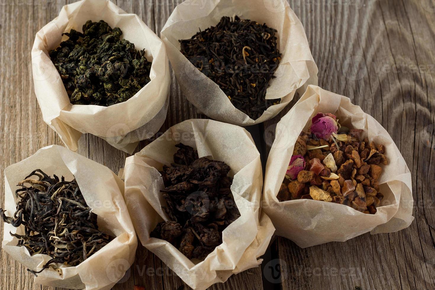 Different sorts of tea in paper bags photo