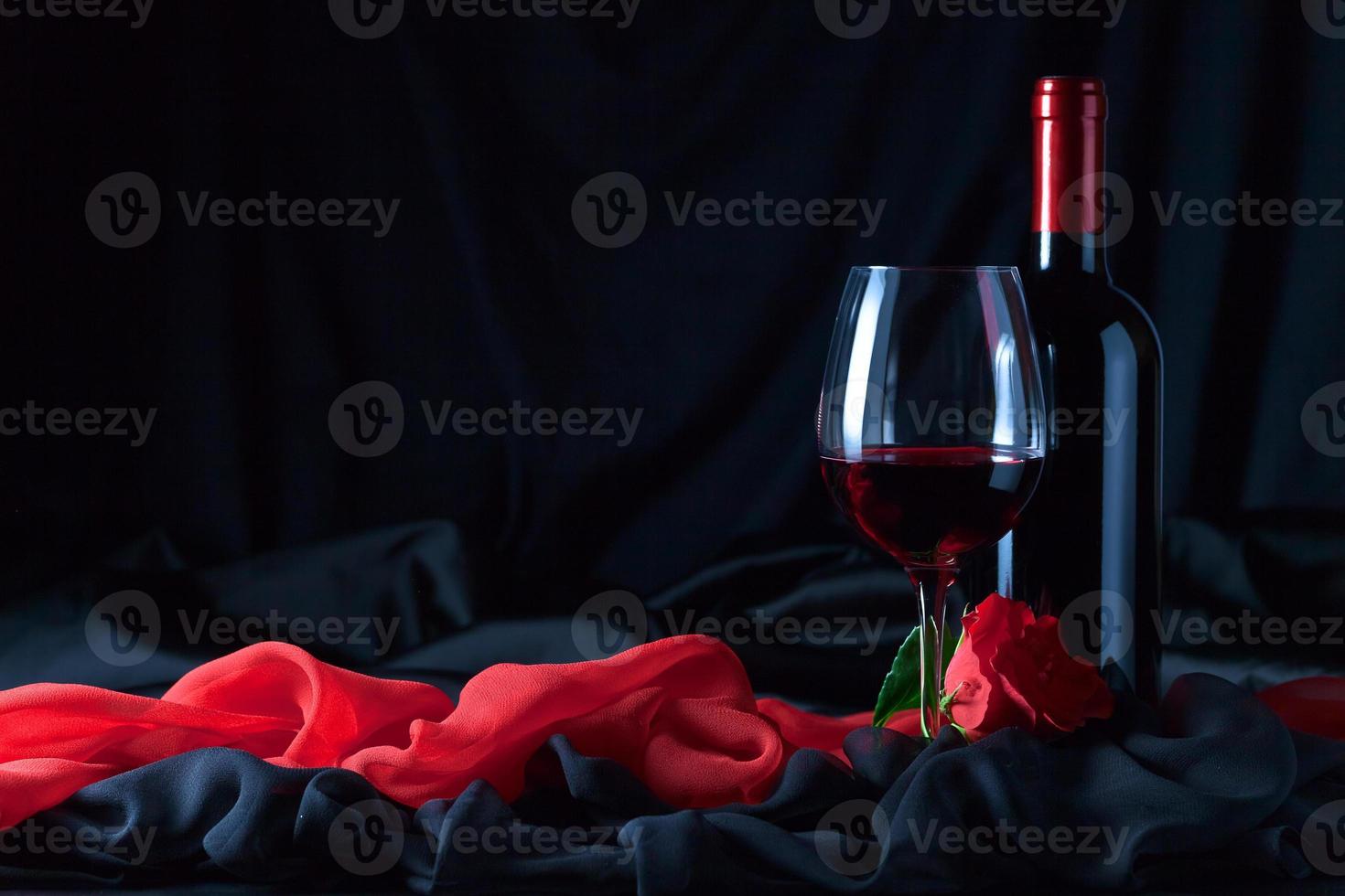 bottle and glass with red photo