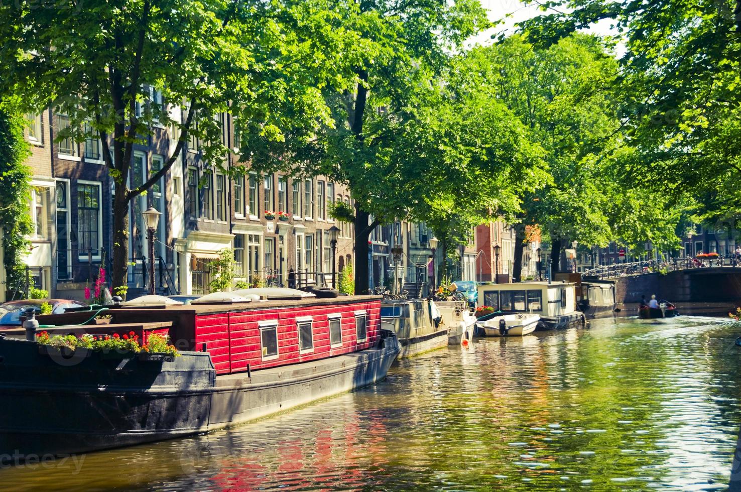 Canal boats in Amsterdam photo