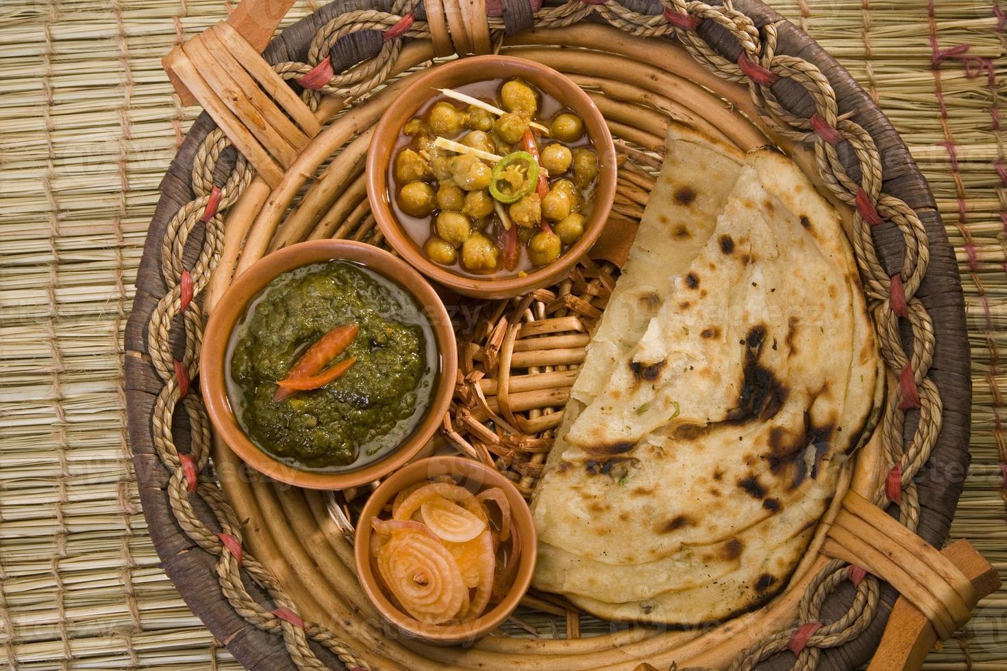 Palak Paneer, Dal with Paratha 771332 Stock Photo at Vecteezy