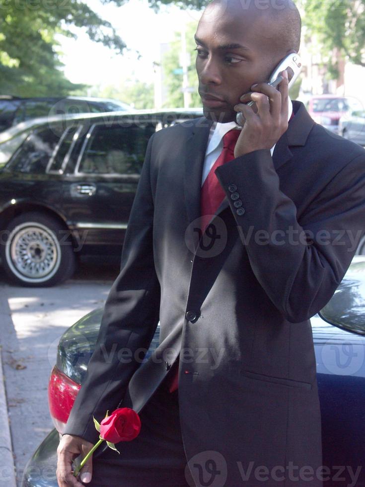 Man in Suit on Cell Phone photo