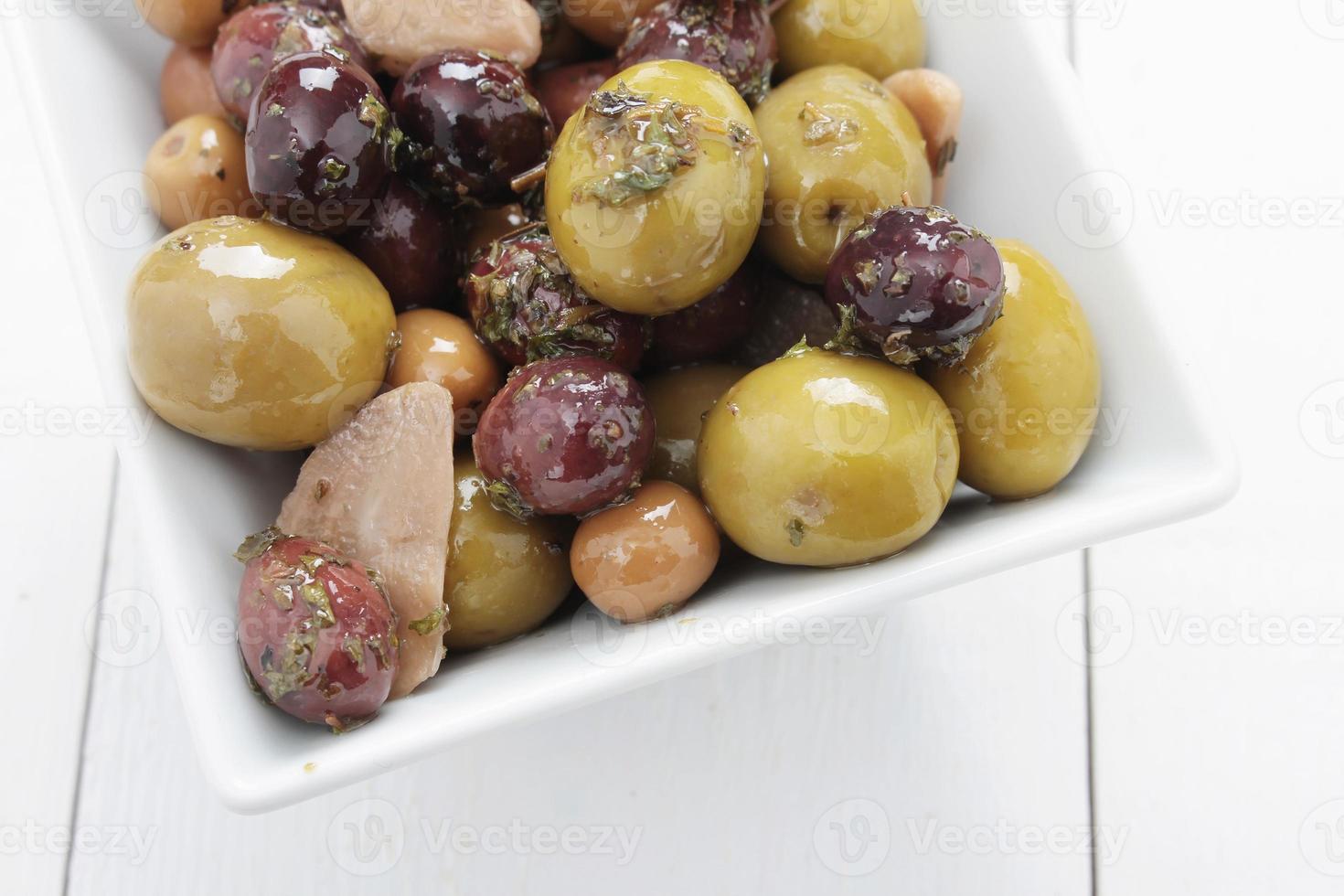 mixed olives antipasto in dish photo