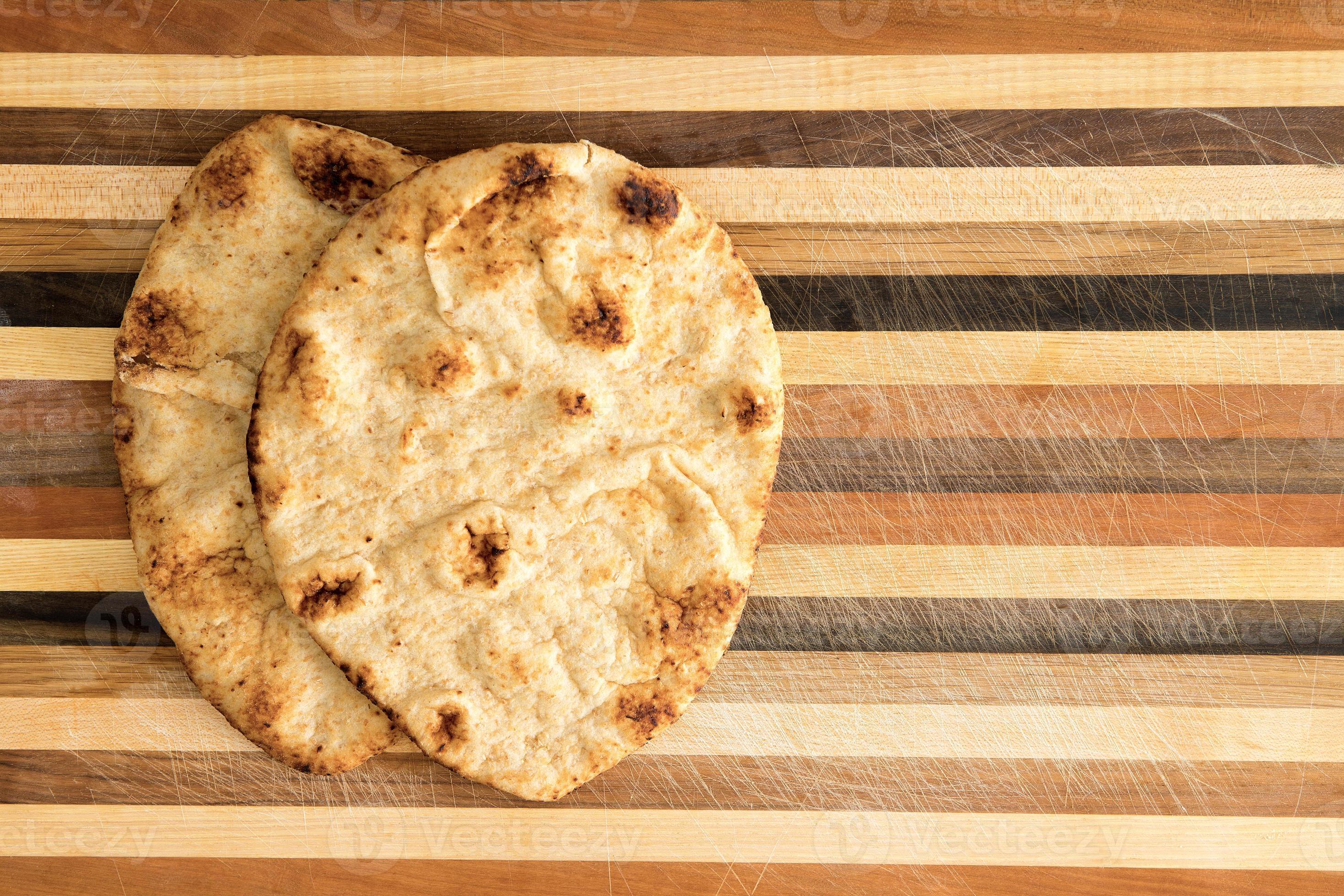 Crisp crusty naan whole grain flatbread 774066 Stock Photo at Vecteezy