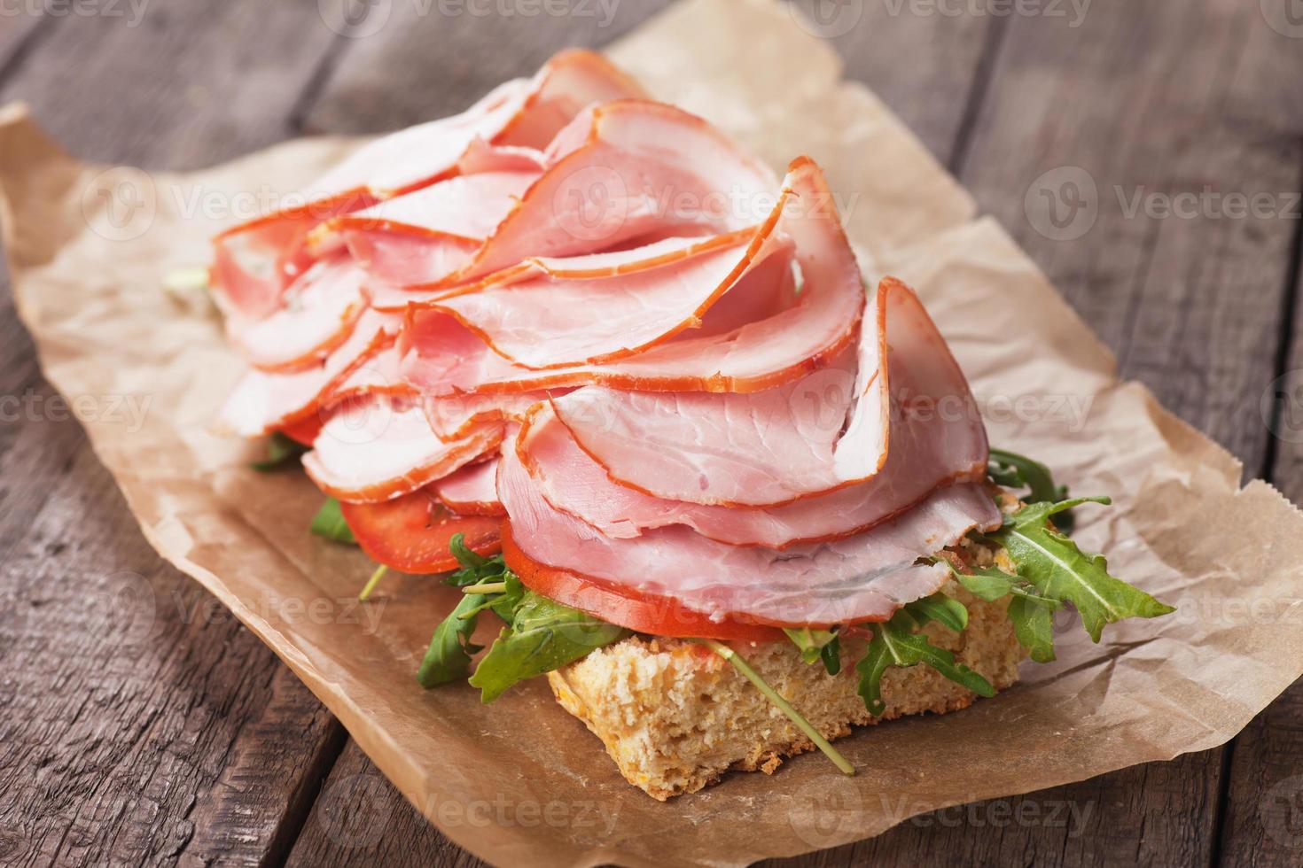 Submarine sandwich with smoked ham photo