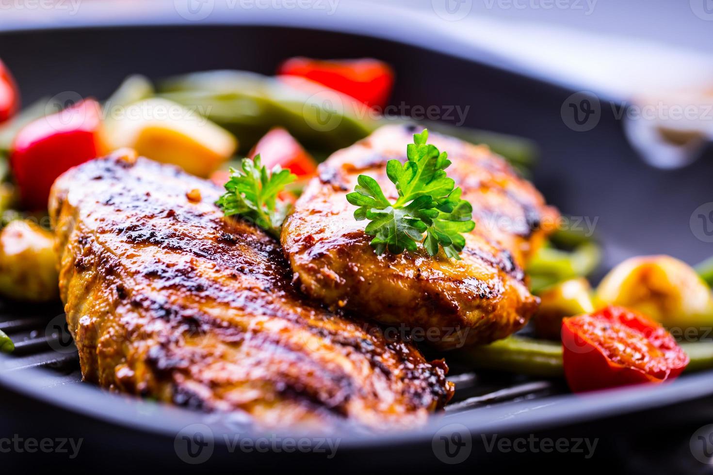 Grilled chicken breast in different variations photo
