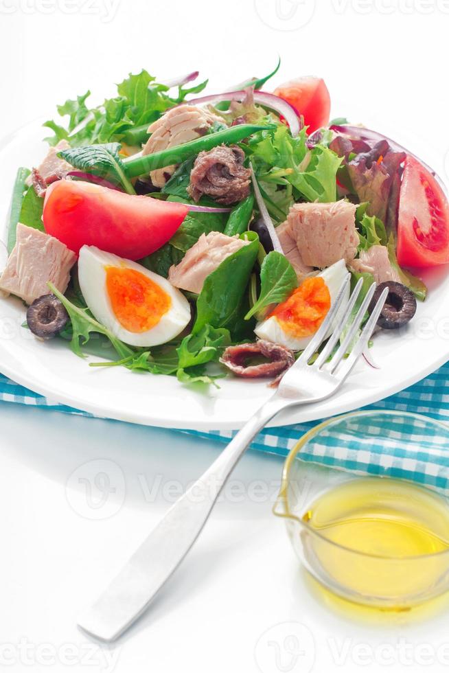 nicoise salad on white background photo