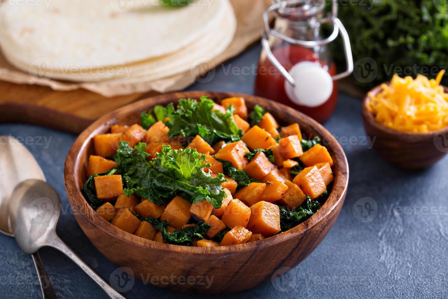 Making quesadillas with kale and sweet potato photo