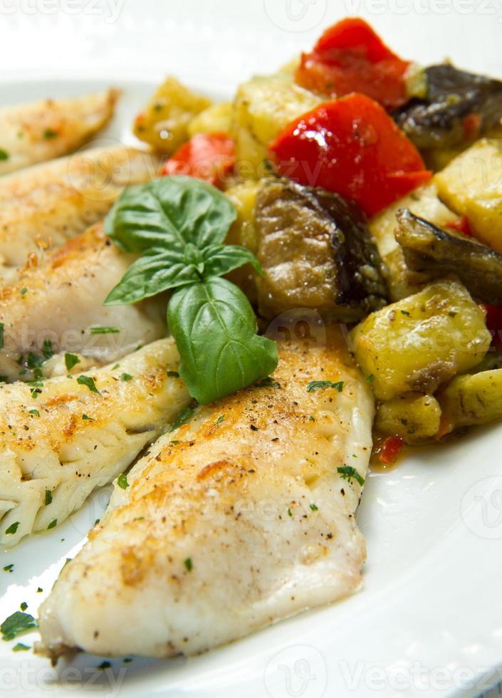 fish fillet with vegetables photo