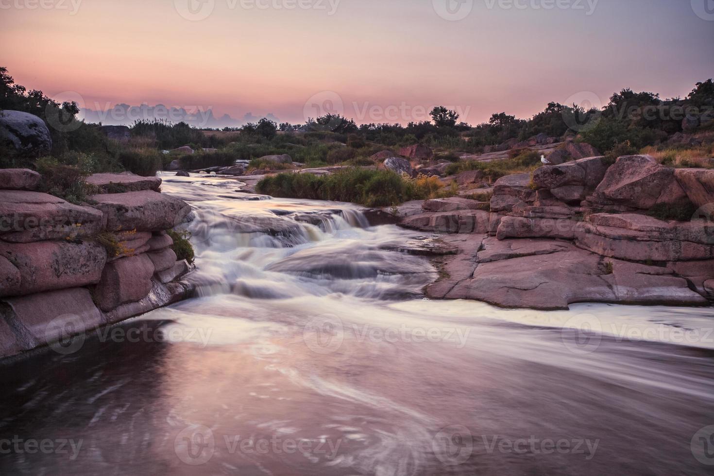 Rough river with rapids photo