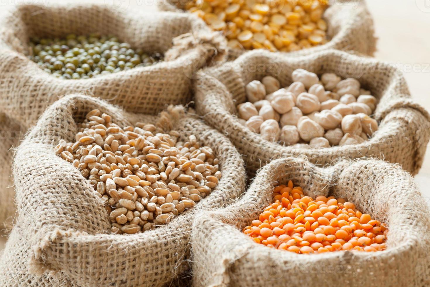 bags with wheat, chick peas, red lentils and green mung photo