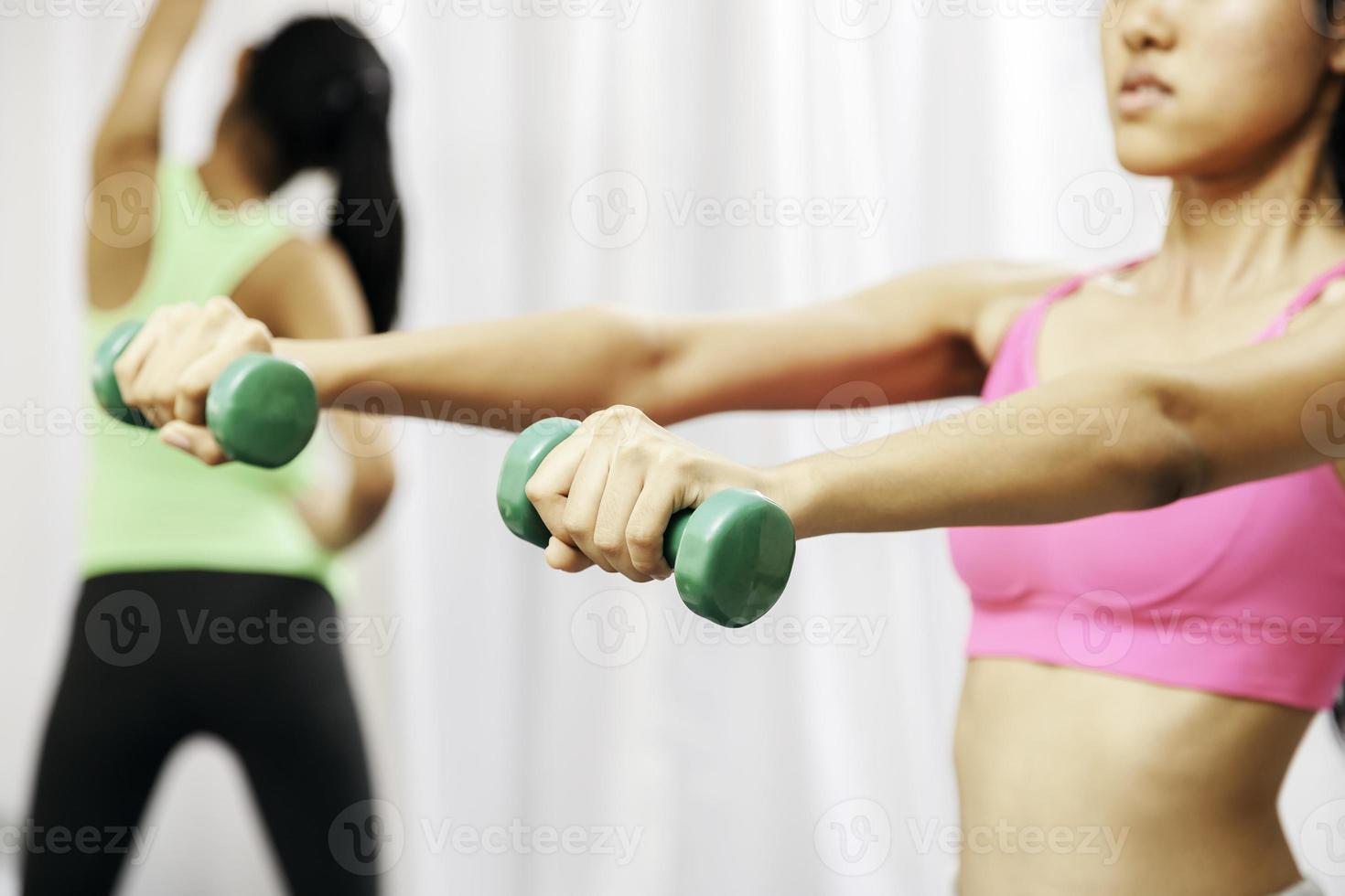 women doing exercise photo