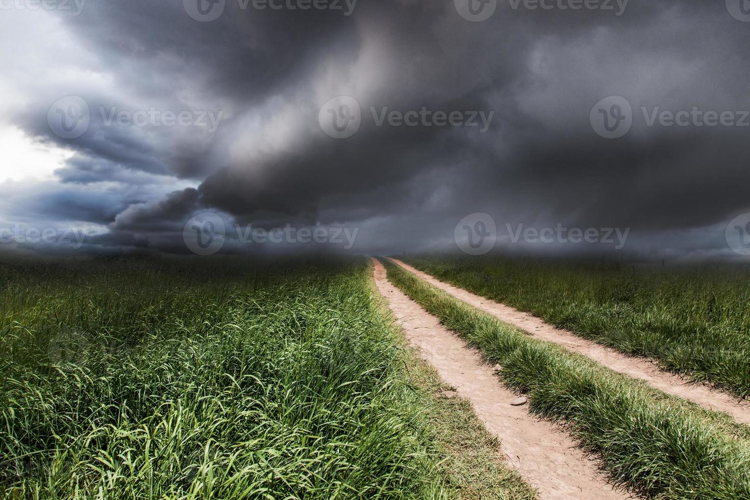 Dramatic landscape with a rural road photo