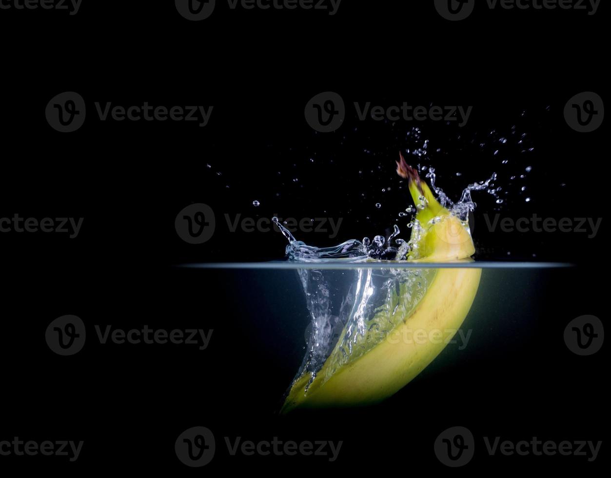 Fruit Splashing into water photo