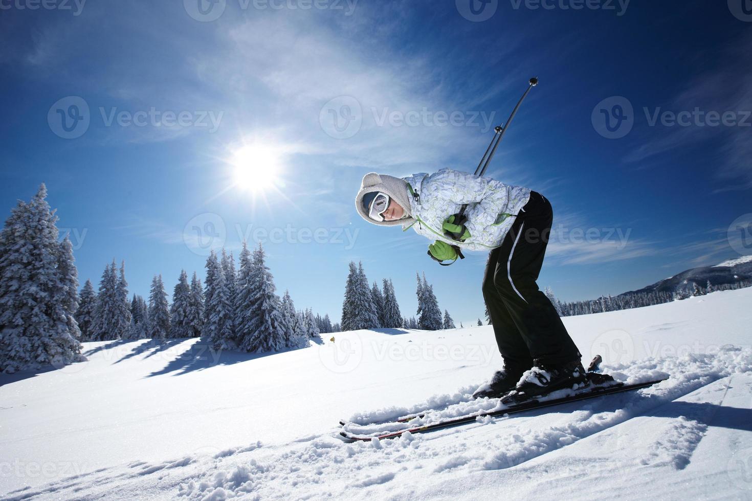 young woman skiing photo