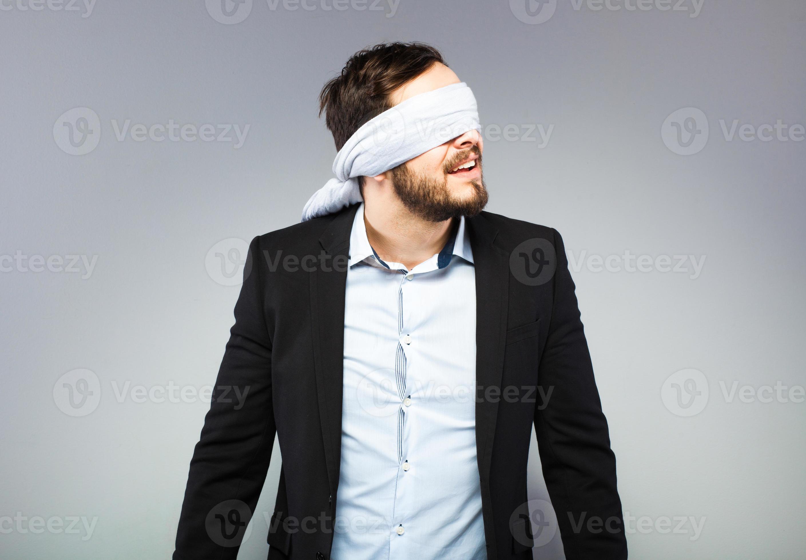 Blindfolded elegant man 787240 Stock Photo at Vecteezy
