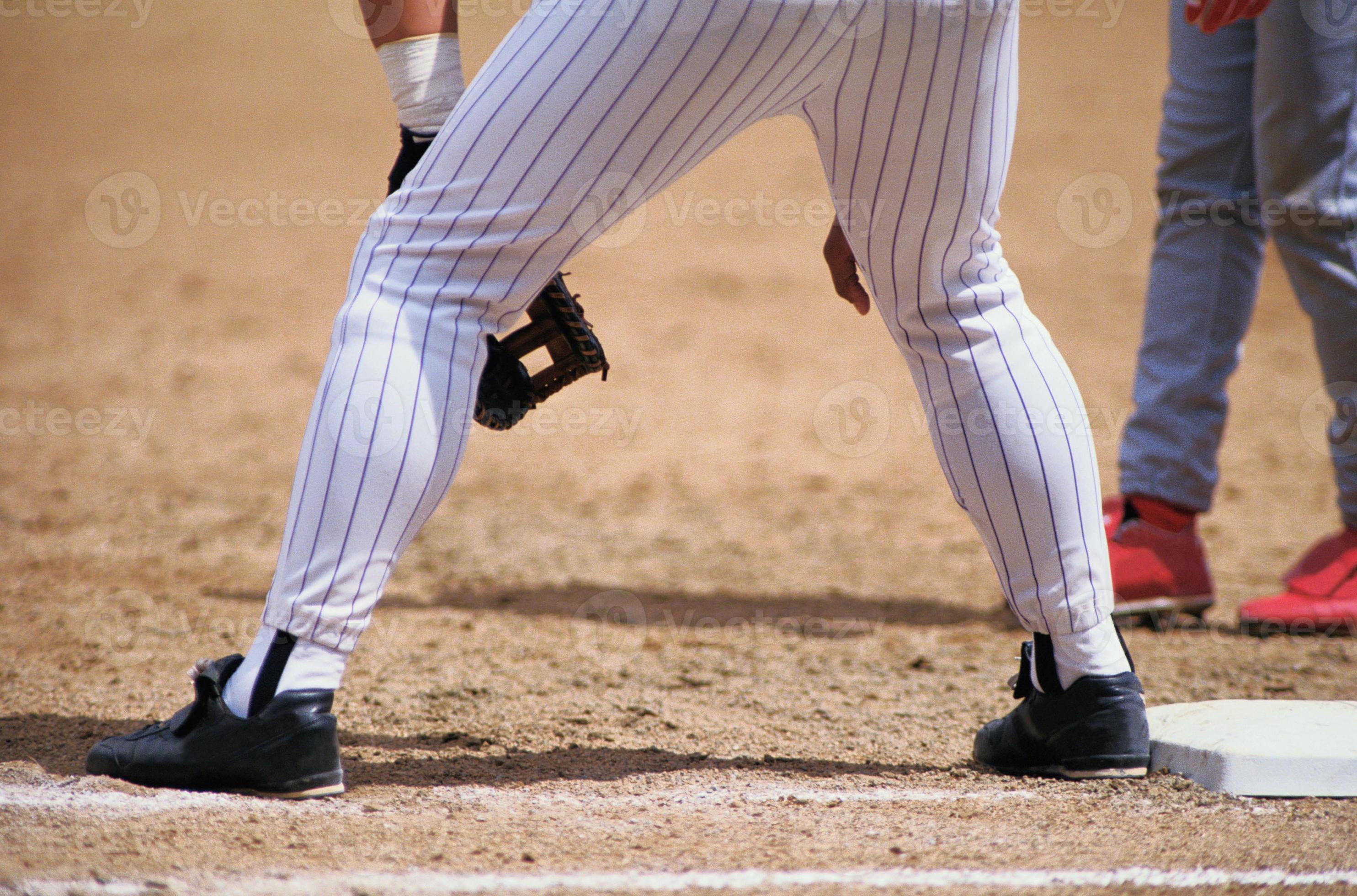 Baseball player legs 787944 Stock Photo at Vecteezy