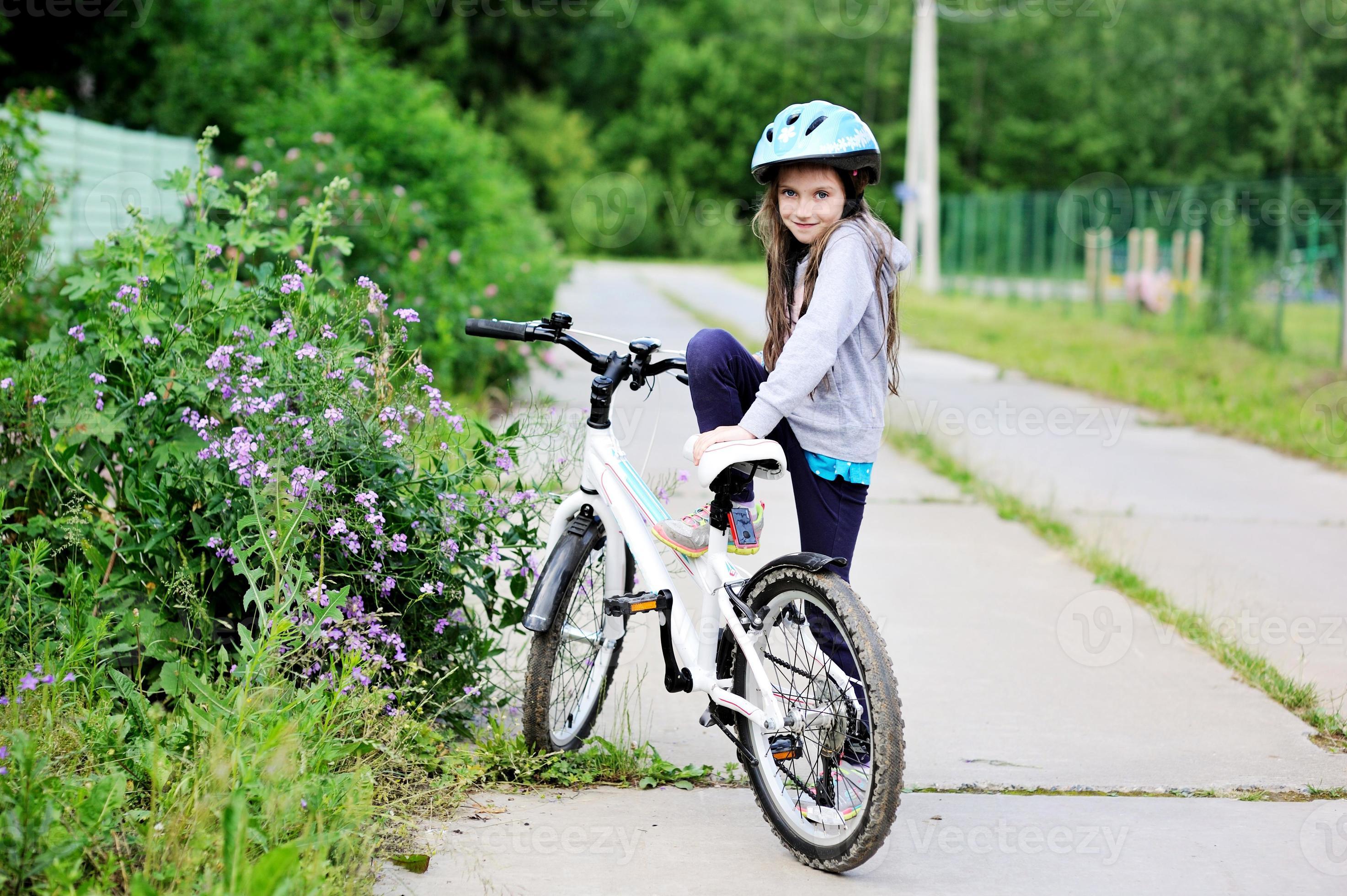 little girl on bicycle