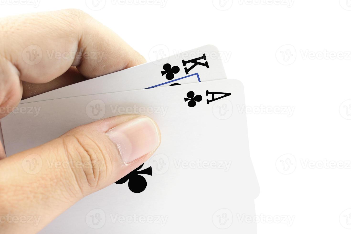 Black jack card of clubs in the hand photo