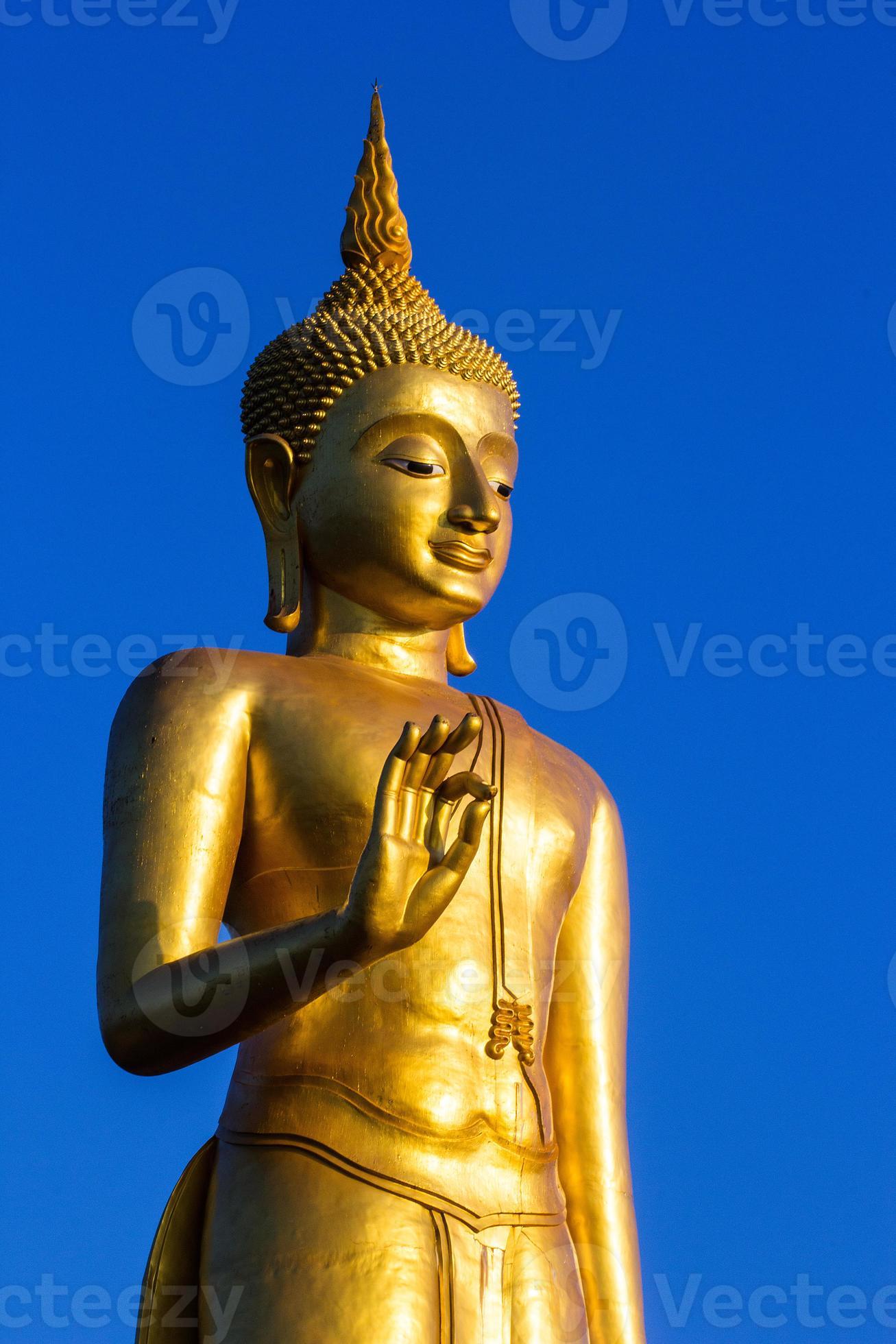 Stand Golden Buddha Statue In Thailand Stock Photo