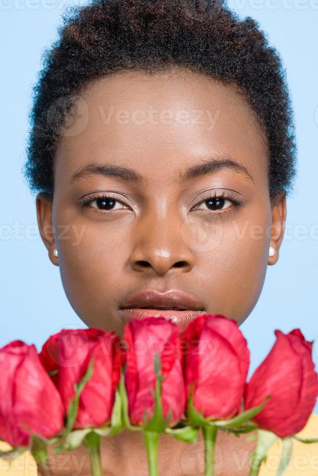 Woman holding roses photo