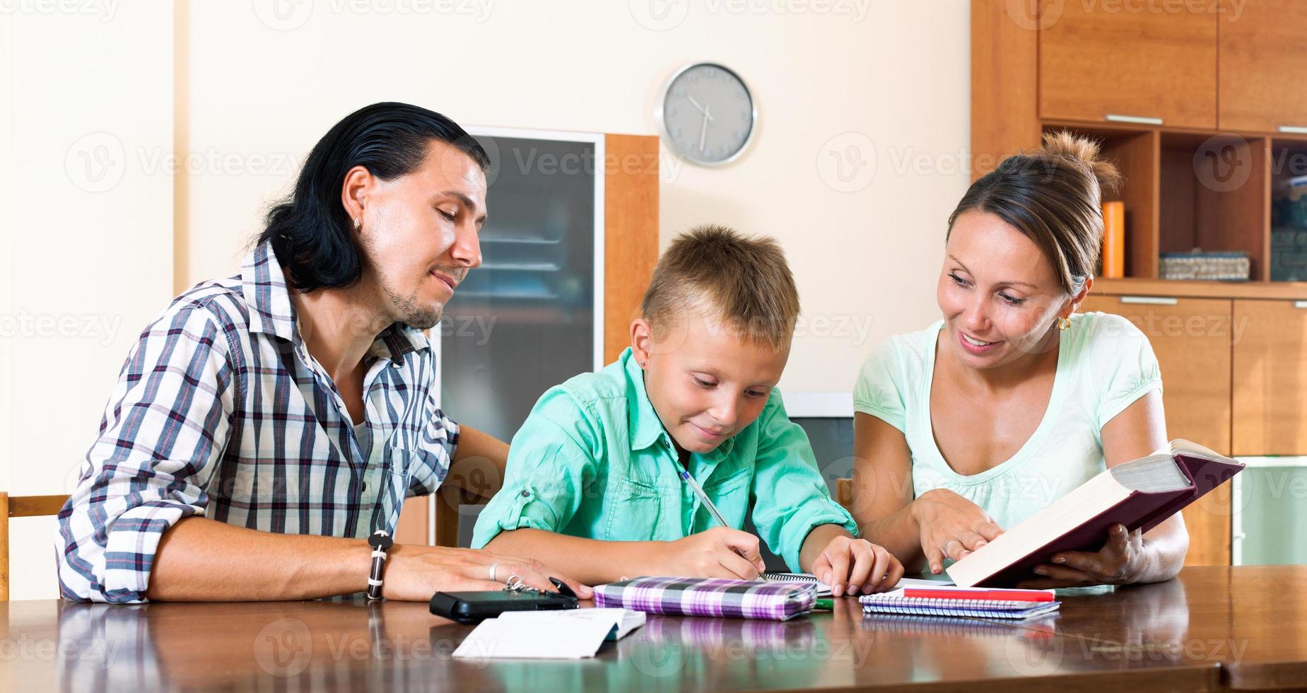 Family doing homework photo