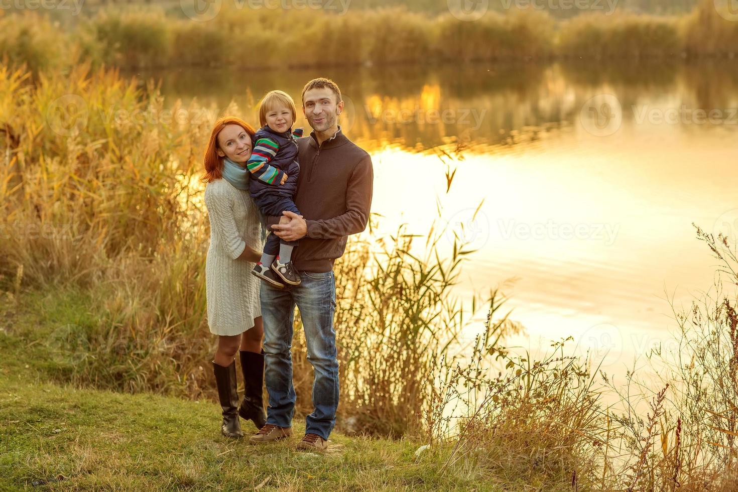 Young Attractive Parents and Child Portrait photo