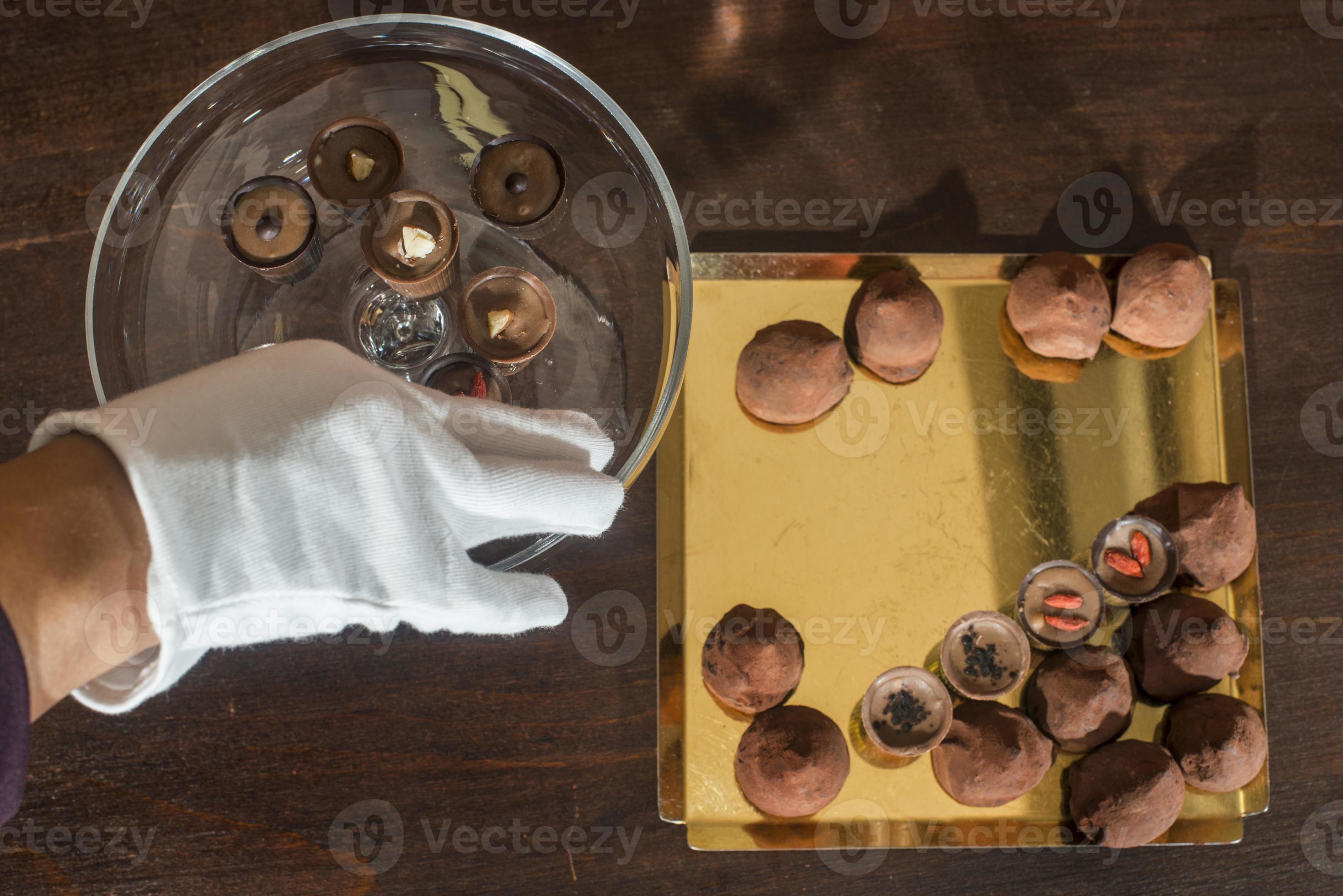 Chocolates in a luxurious glass dish photo