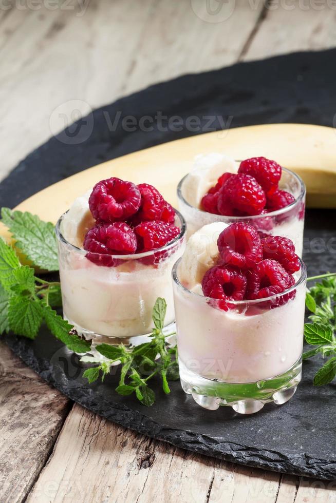 Ice cream with banana and raspberry photo