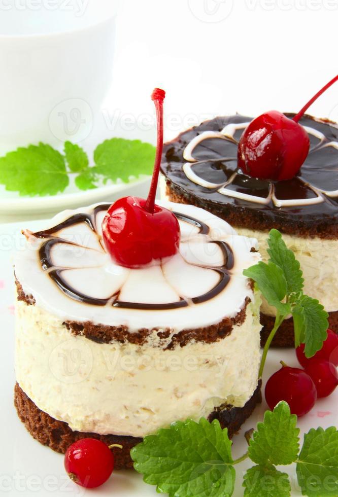Chocolate cakes with cherry photo