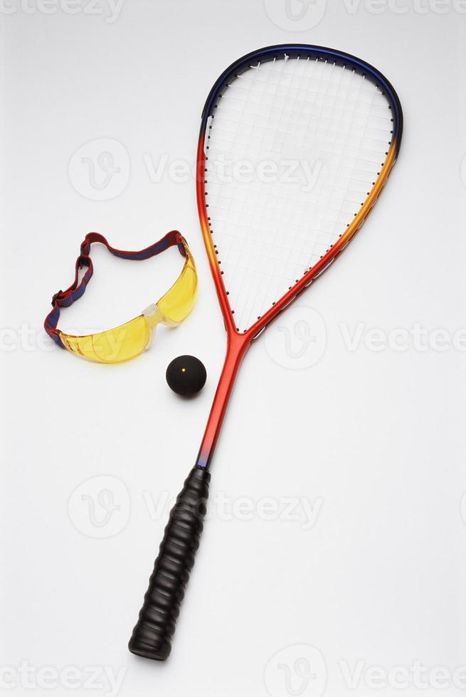 Squash racket with ball and goggles 809996 Stock Photo at Vecteezy