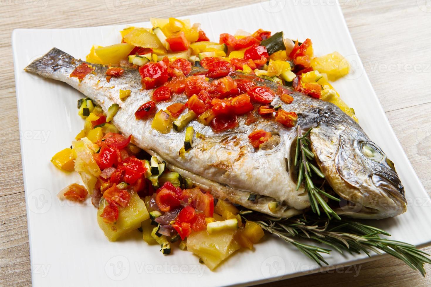 baked fish with vegetables photo