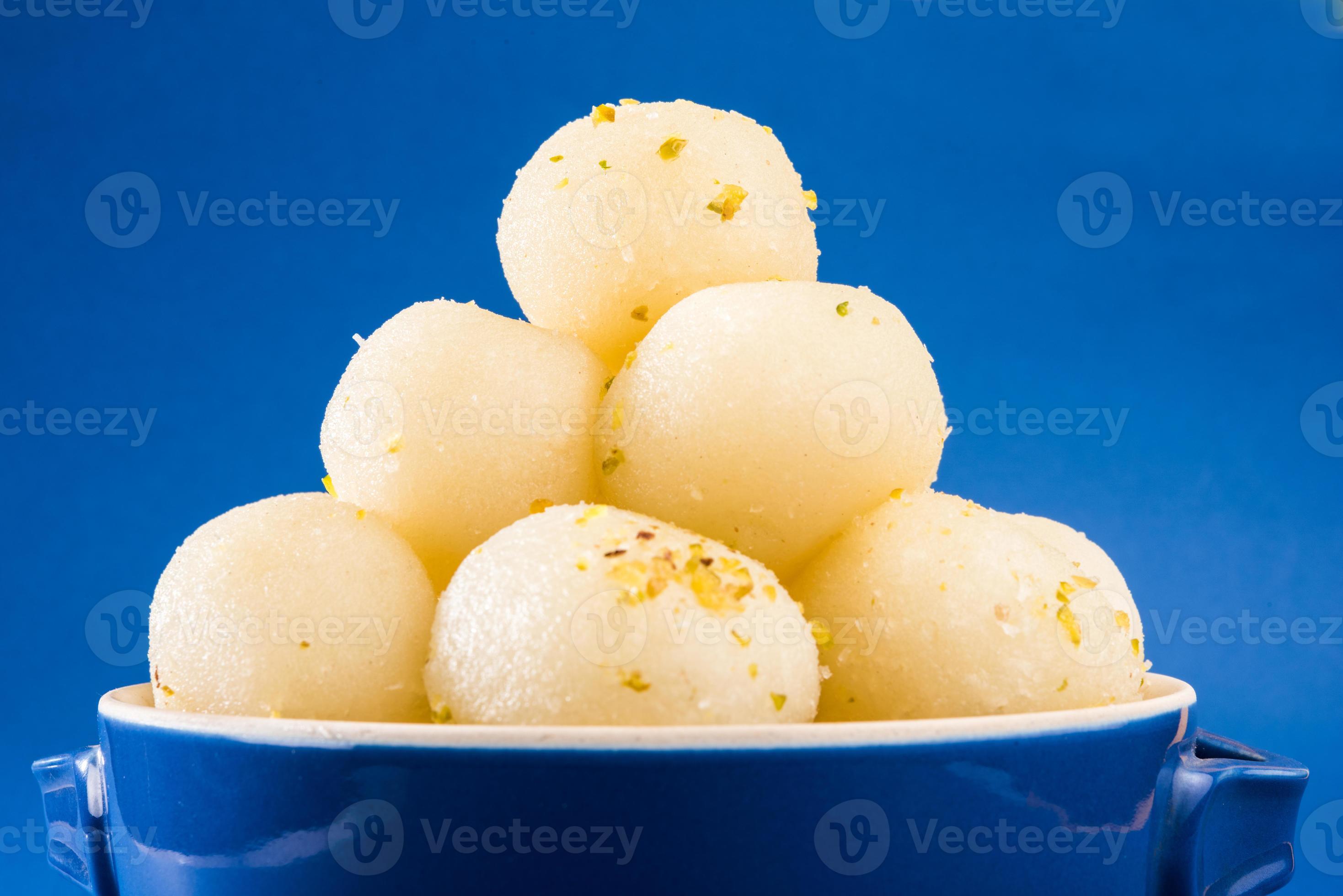 Indian sweet. Rasgulla is a syrupy dessert Indian cottage cheese 818447