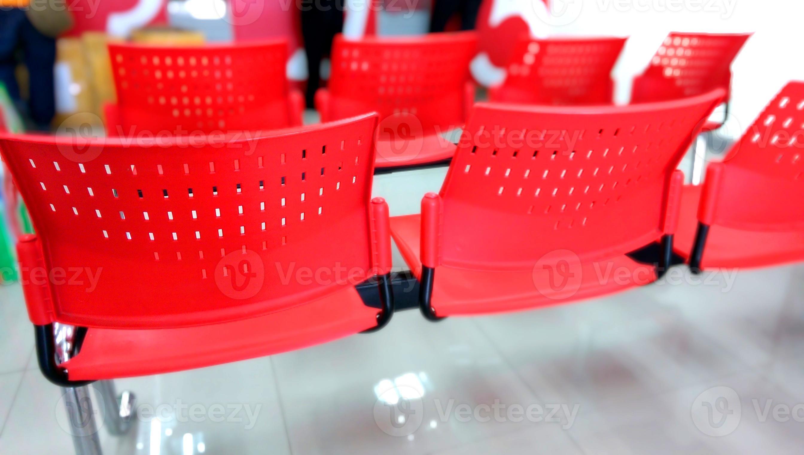 row of red chair at post office photo