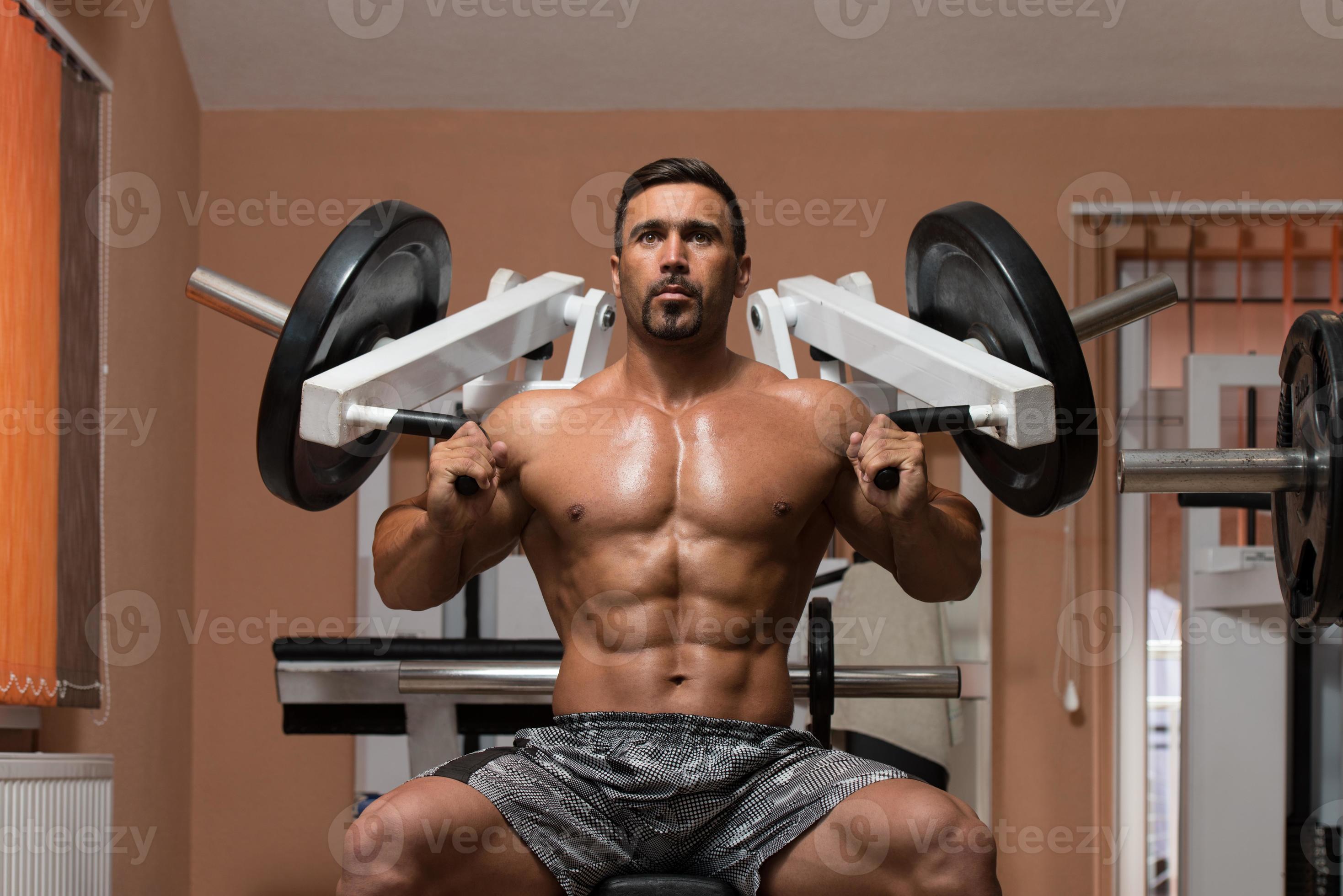Bodybuilder Exercising Shoulders photo
