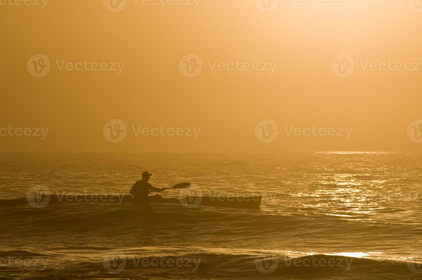 kayak de mar al amanecer foto